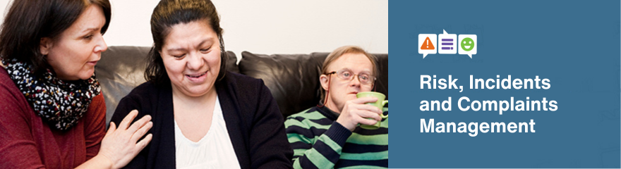Three people sit on a sofa. One woman speaks to a woman with disability using a laptop. A man on the end of the sofa drinks from a mug.To the right is a blue background with white text reading Risk, Incidents and Complaints Management