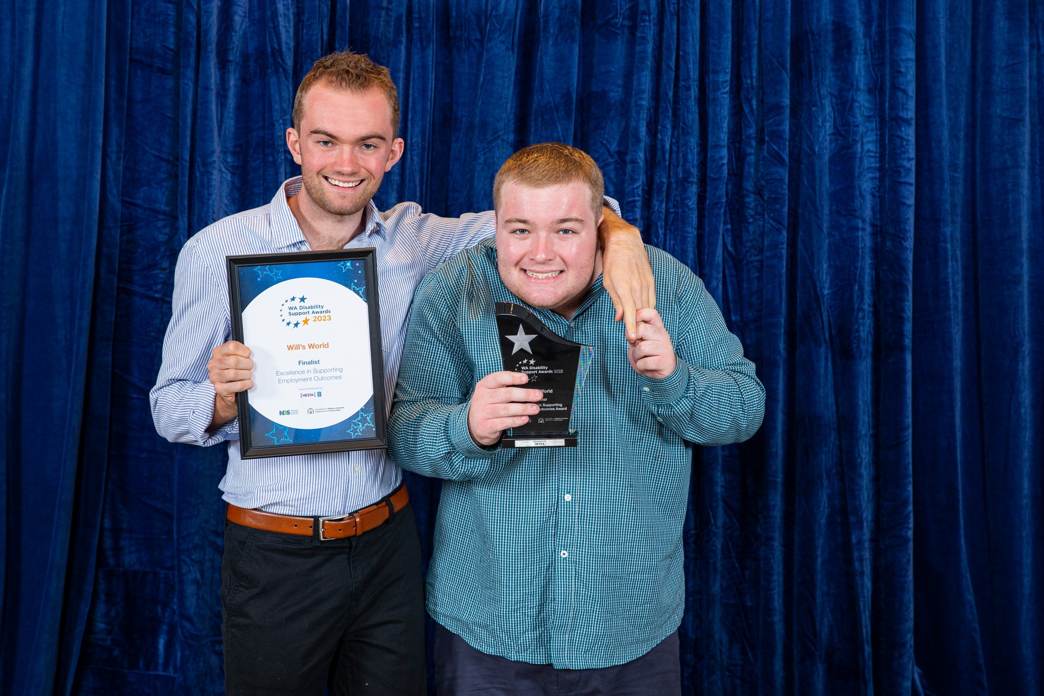 Will (left) of Will's World with the Excellence in Supporting Employment Outcomes Award with Support Team Leader Nathan Allaway. 